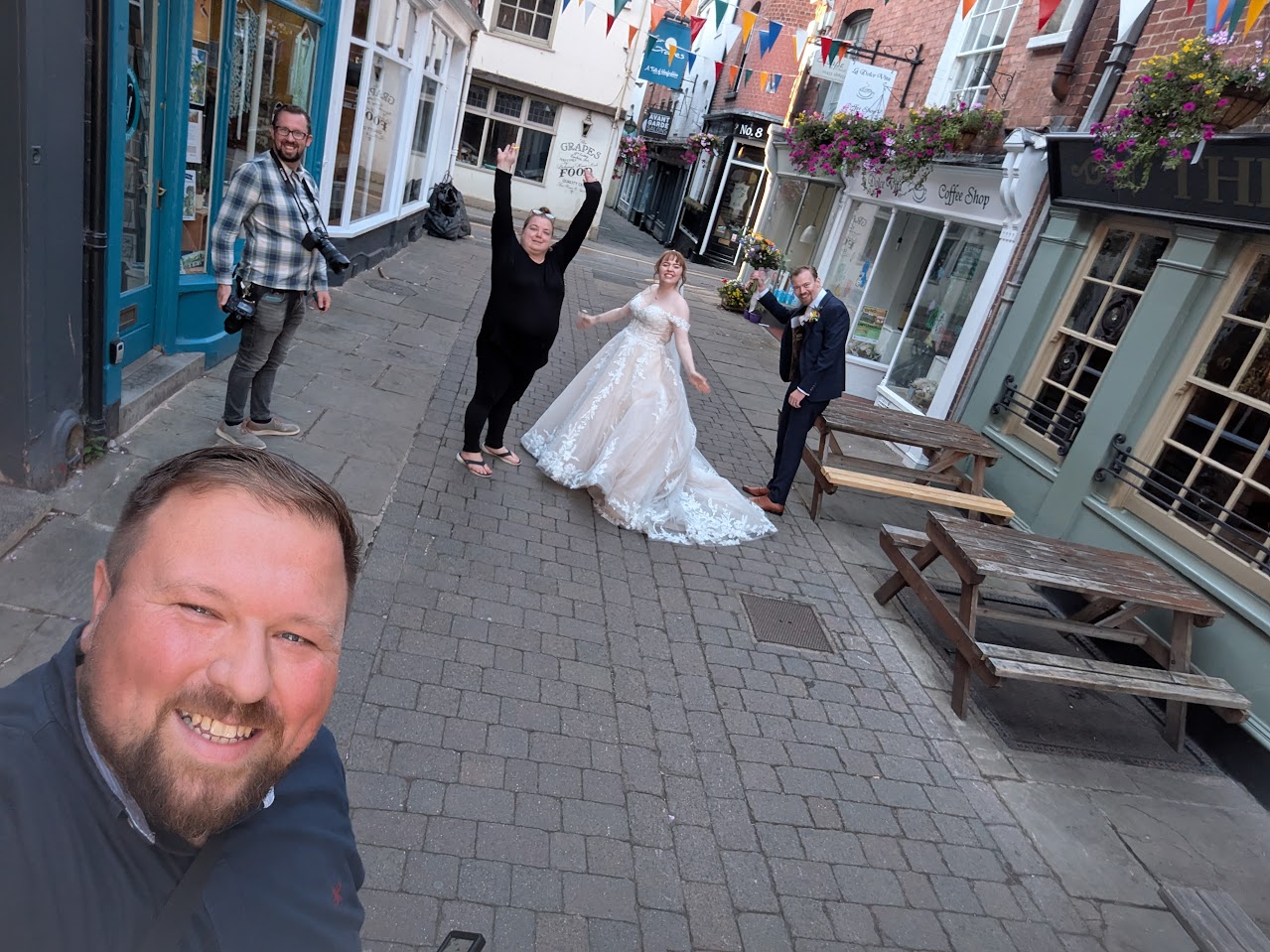 Chris celebrating with wedding party